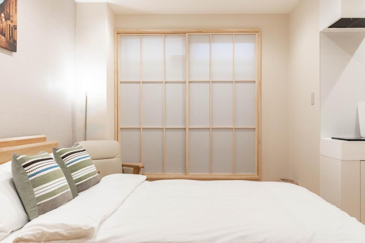 Appartement 大阪道顿堀 铁甲猫の家 Extérieur photo